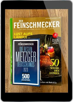 iPad mit dem Cover des Magazins "Der Feinschmecker", das köstliche Speisen und Rezepte präsentiert.  